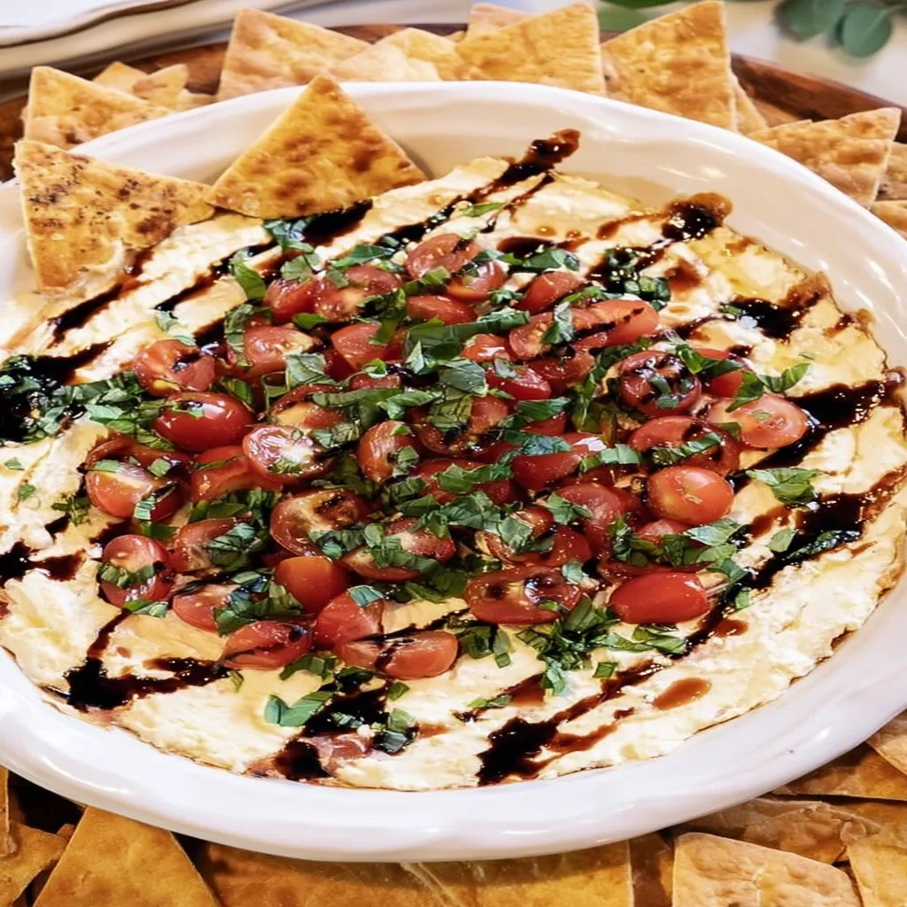 bruschetta dip, savory appetizer, tangy tomatoes, crispy bread, flavorful herbs
