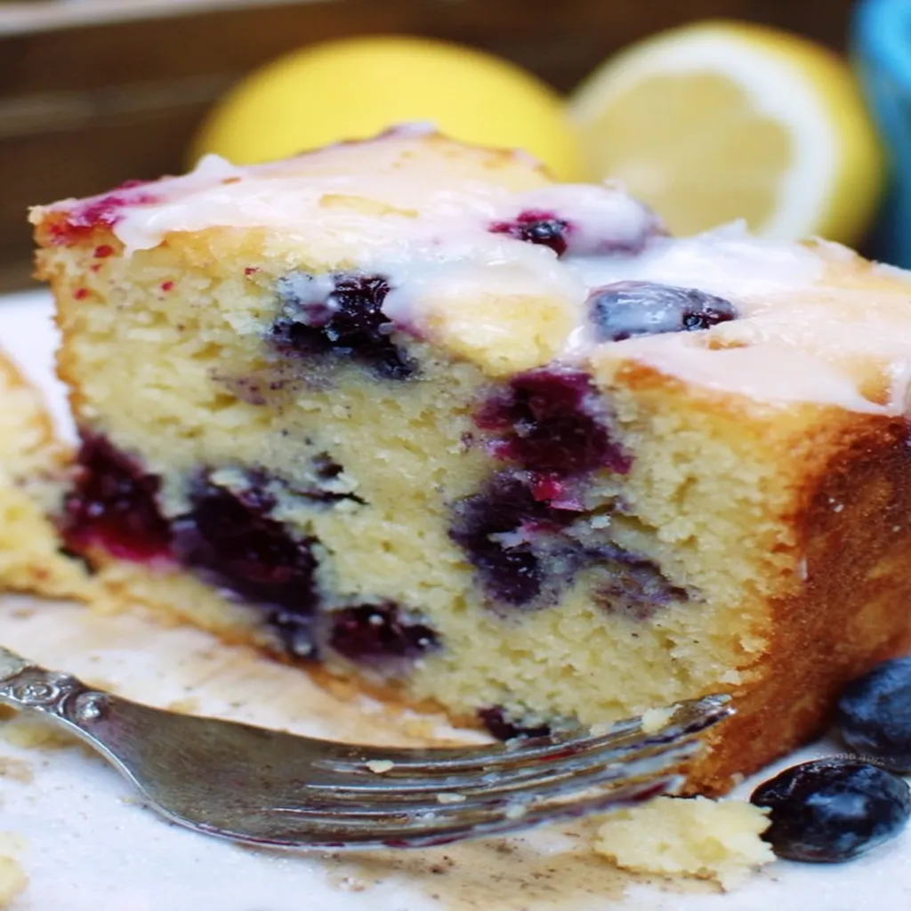blueberry lemon pound cake, moist, zesty, bursting with flavor, delightful tanginess