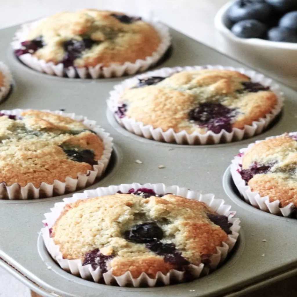 healthy blueberry muffins, almond flour, juicy blueberries, nutty, moist texture, deliciously wholesome