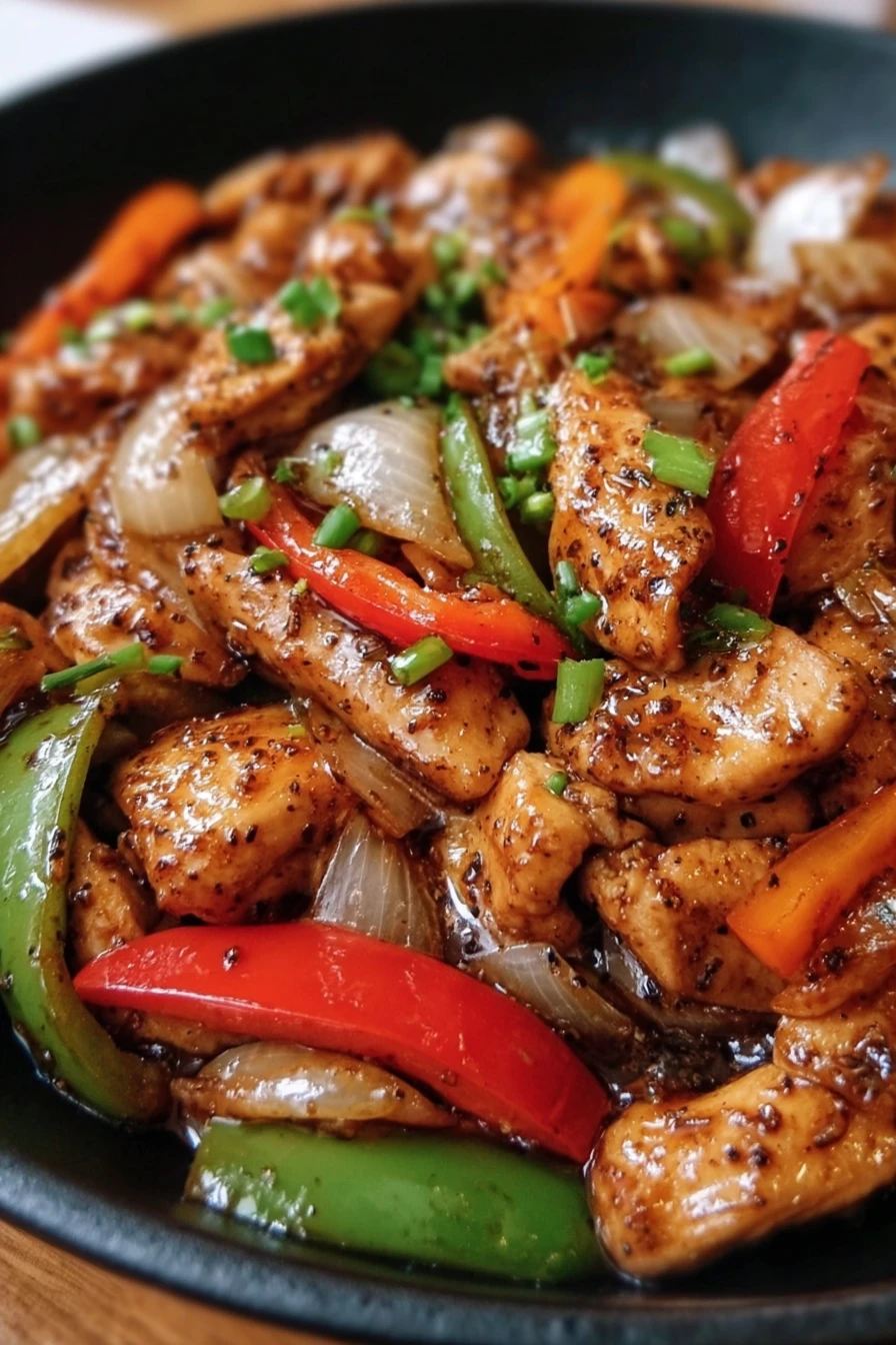 black pepper chicken stir-fry, savory, spicy, sizzling, flavorful, aromatic vegetables
