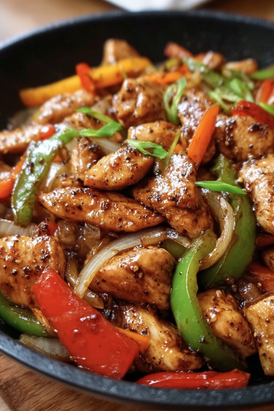 black pepper chicken stir-fry, savory, spicy, sizzling, flavorful, aromatic vegetables