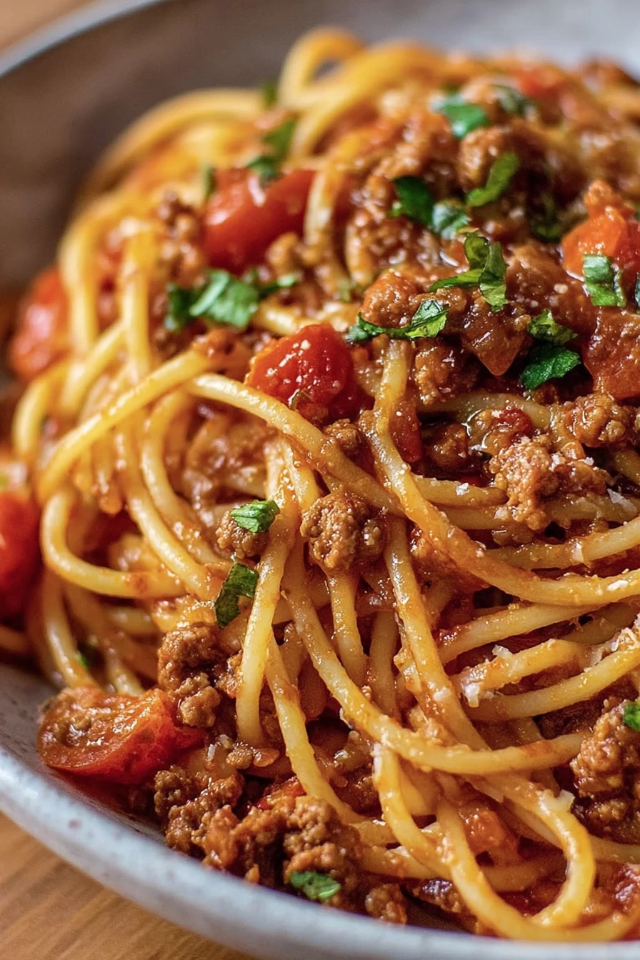 southern spaghetti, savory, flavorful, al dente, cheesy, comforting, hearty, delicious
